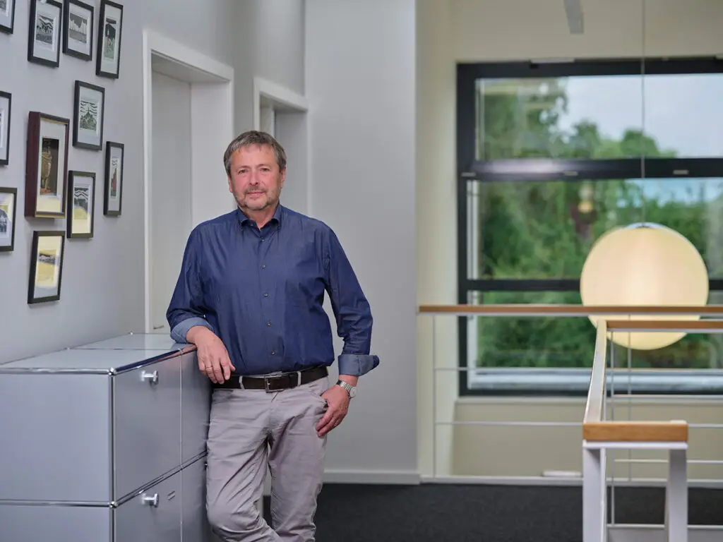 Portrait of the naval architect and managing director.